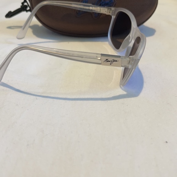Maui Jim’s sunglasses blue mirror lens, clear frosted...
